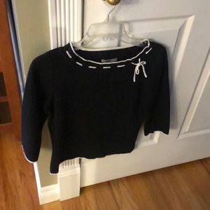 Women’s Black Three Quarter Length rounded neck shirt with white accents